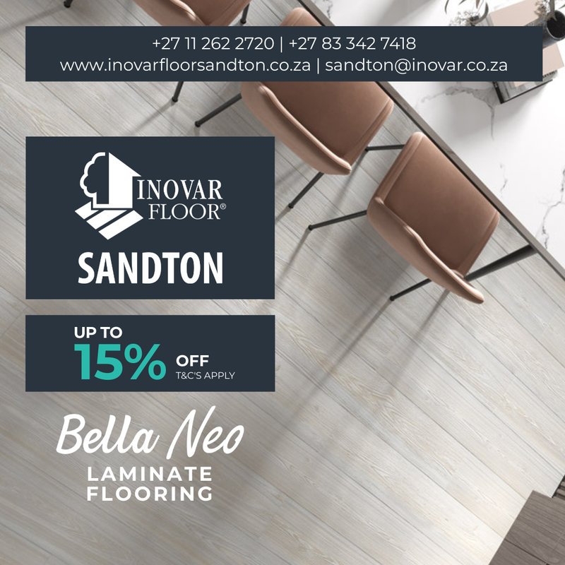 Top-down view of a chic dining space with dusty rose chairs and light-colored Bella Neo laminate flooring planks.